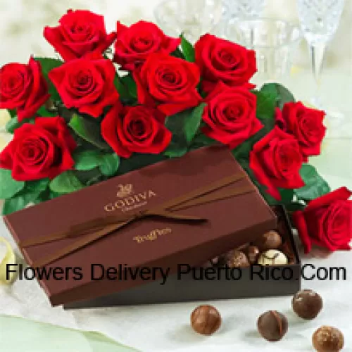 Un magnifique bouquet de 11 roses rouges avec des remplissages saisonniers accompagné d'une boîte de chocolats importés